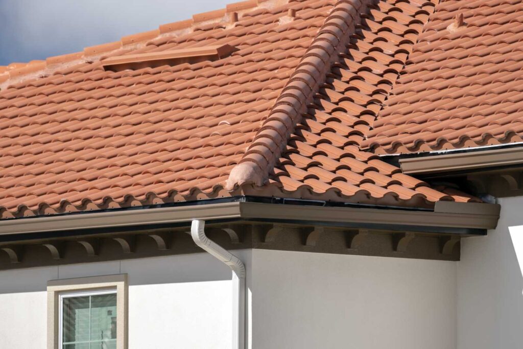 gutters on house with ceramic roof